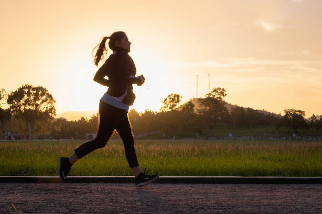 Woman running outdoors as part of a Foundayo weight loss plan
