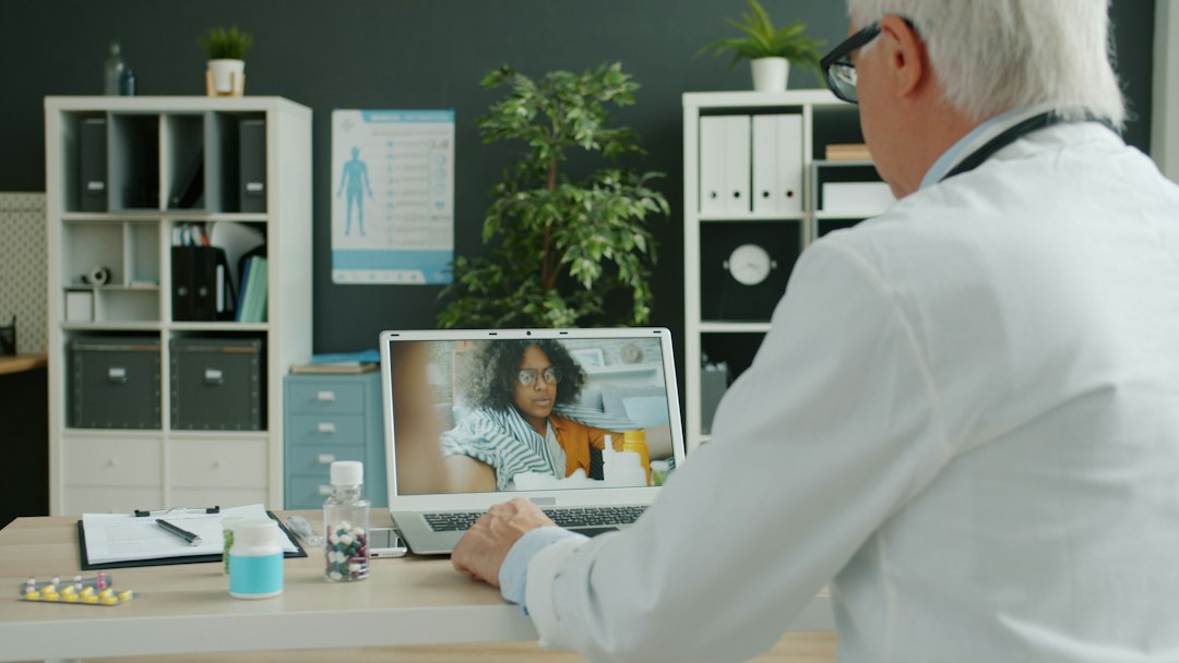 Physician reviewing health history and prescription options during an online weight loss consultation
