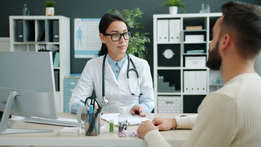 Physician reviewing a Benzphetamine treatment plan with a patient