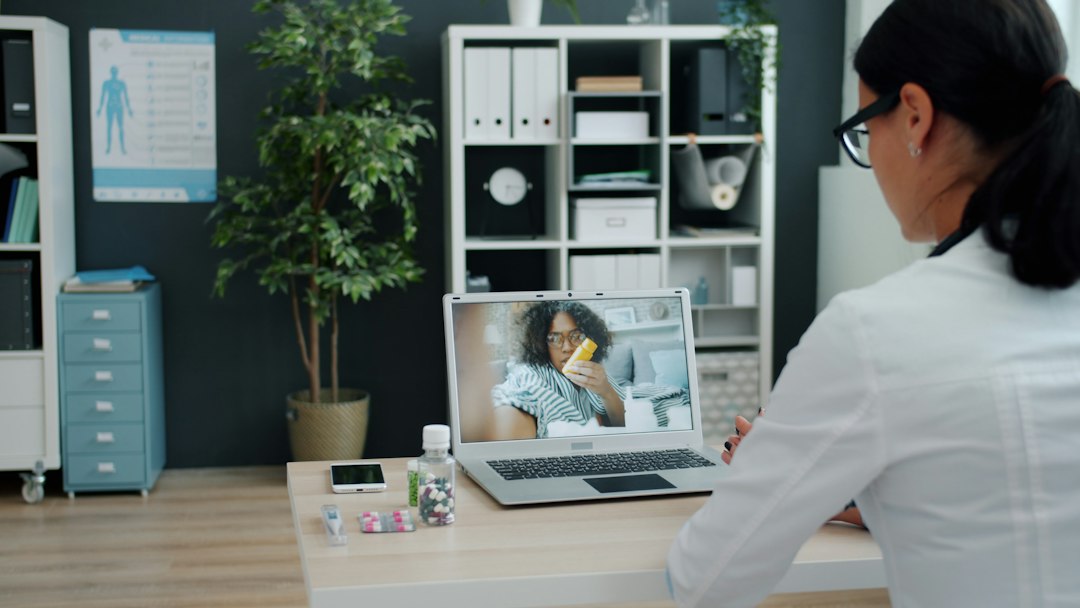 Doctor giving a Foundayo oral pill consultation to a patient online