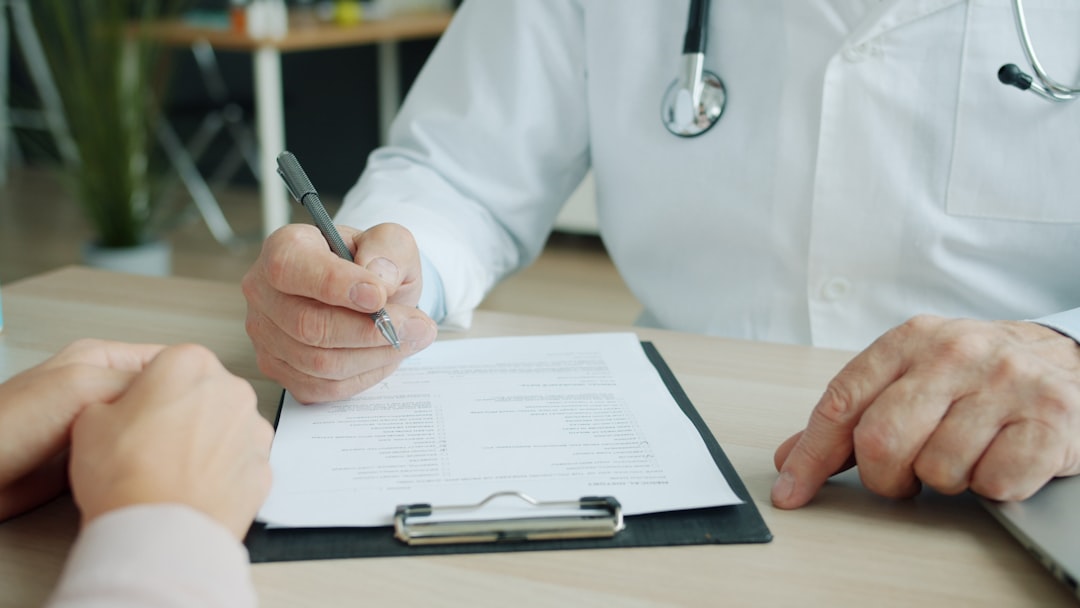 Doctor reviewing health history with a patient during a Semifluid weight loss consultation